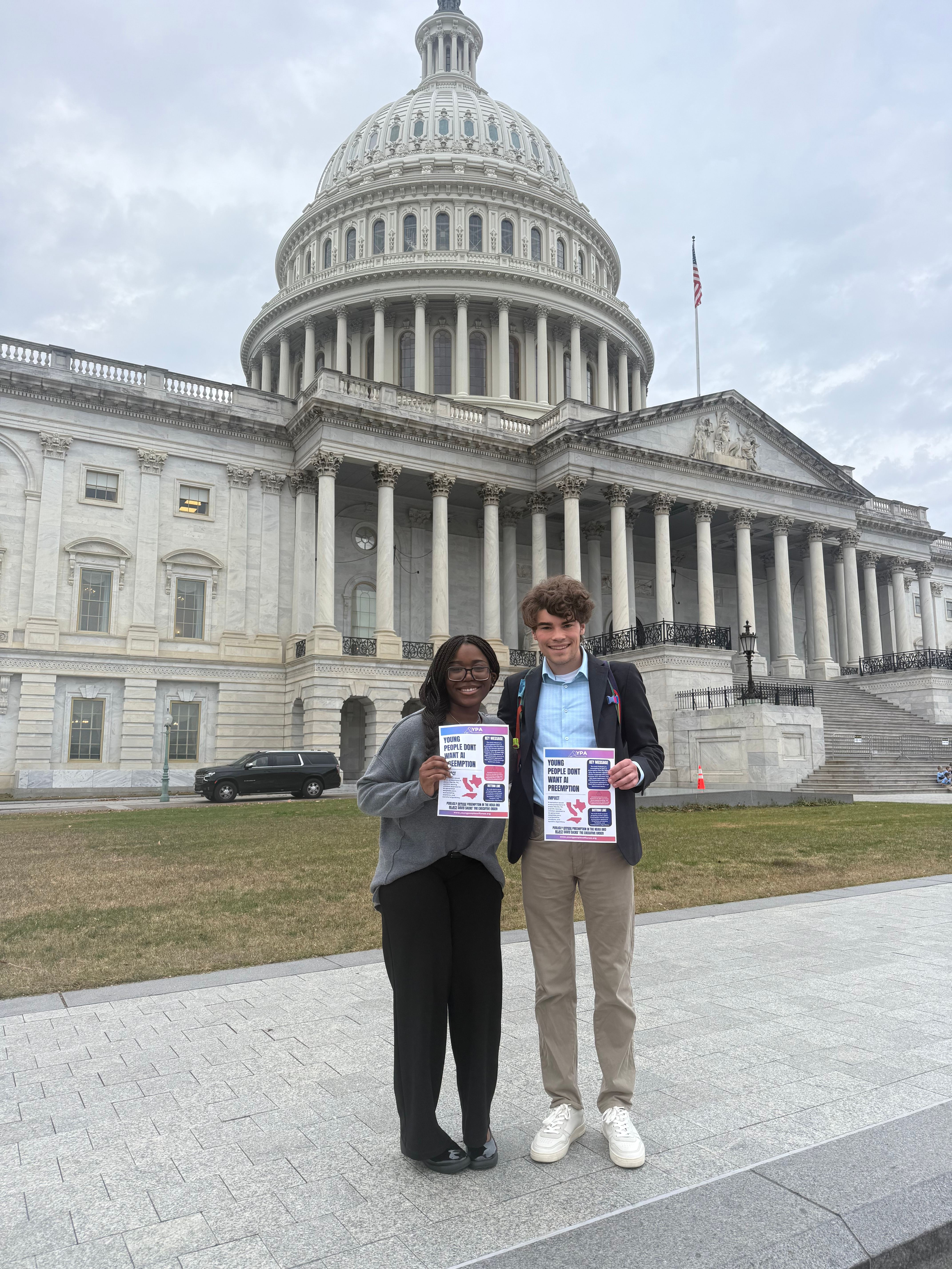 YPA members at Capitol Hill lobby day holding AI policy flyers